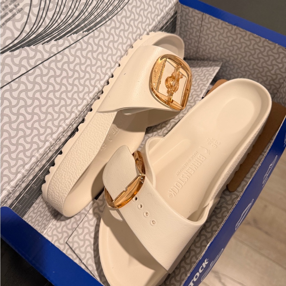Birkenstock Women's White Sandals with Gold Buckle
